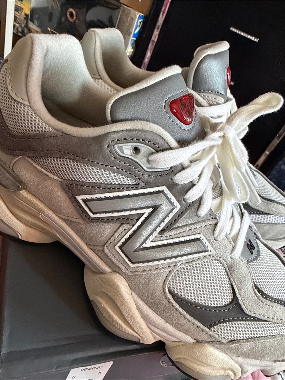New Balance 9060 Gray and White Sneakers with Red Logo Accent